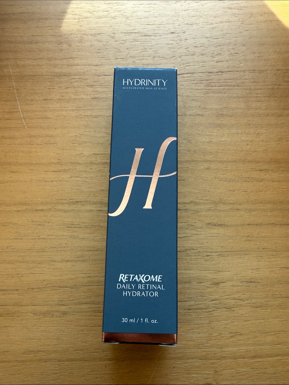 Retaxome Daily Retinal Hydrator - Navy Box with Rose Gold Accent